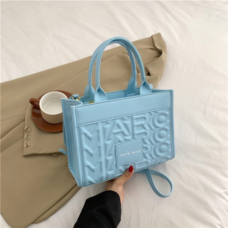 Embossed Letter Tote Bag