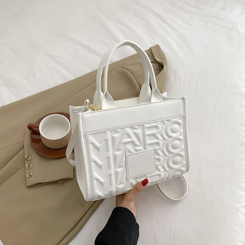 Embossed Letter Tote Bag