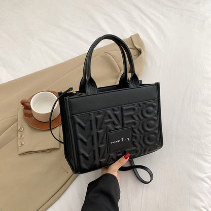 Embossed Letter Tote Bag
