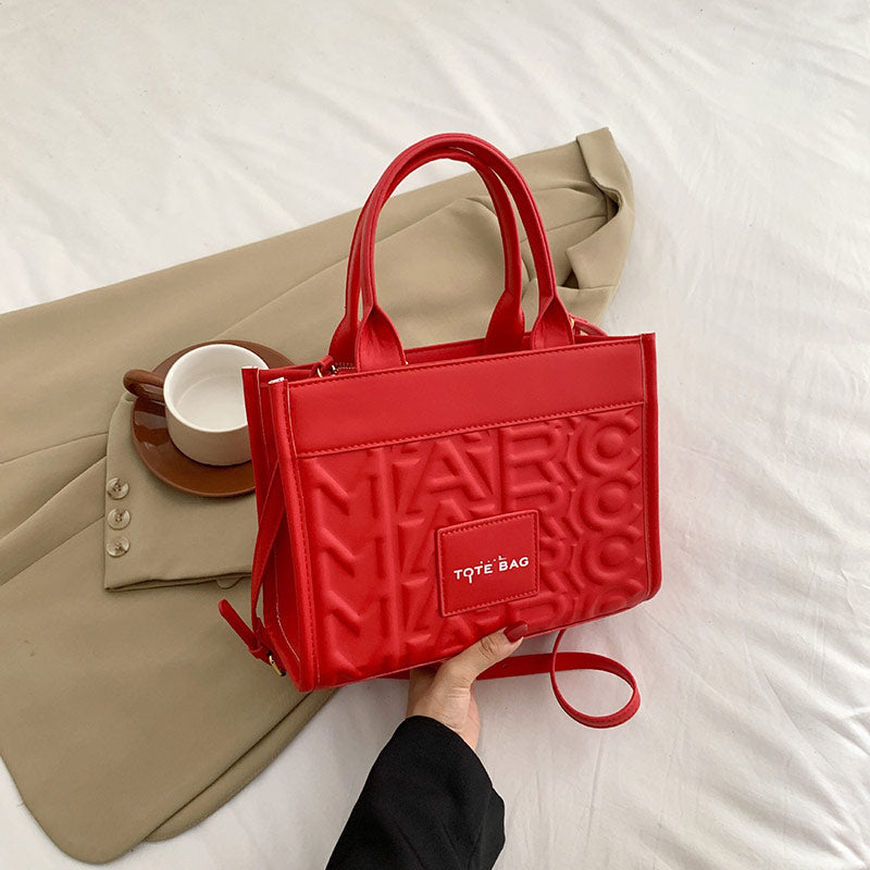 Embossed Letter Tote Bag