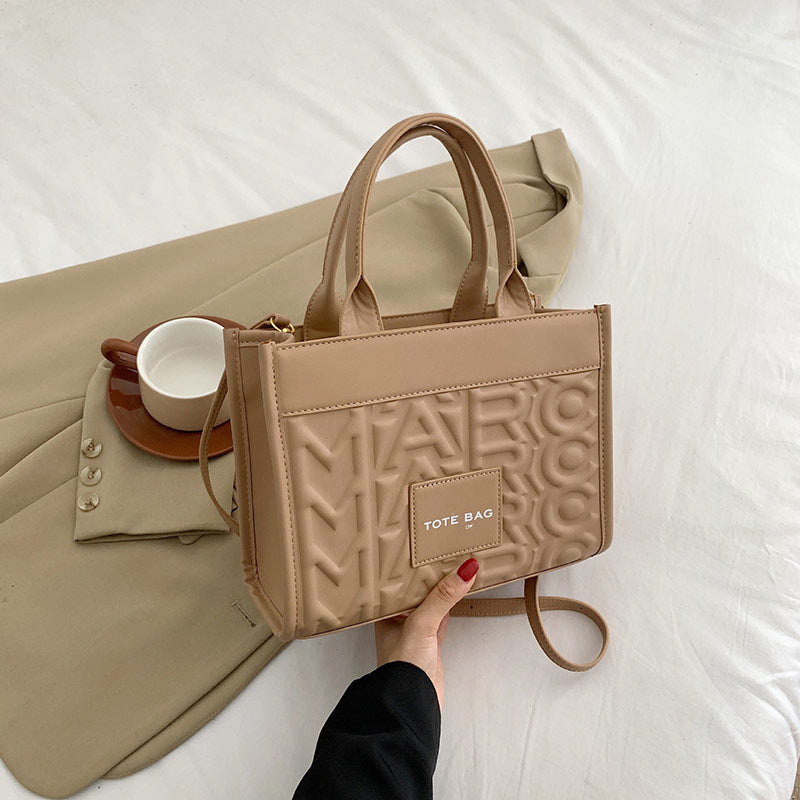Embossed Letter Tote Bag