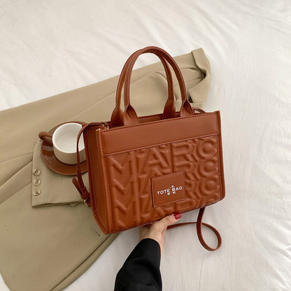 Embossed Letter Tote Bag