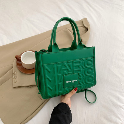 Embossed Letter Tote Bag